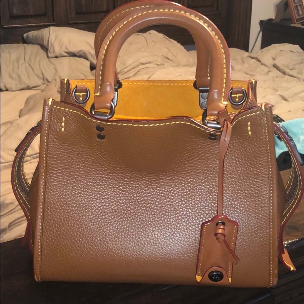 Brown Coach bag with handles